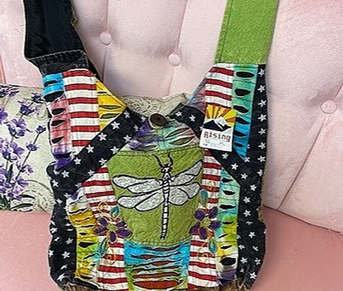 Rising International Handbag