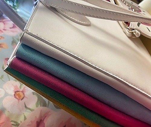 Betsy Johnson White Handbag with Rainbow Accents