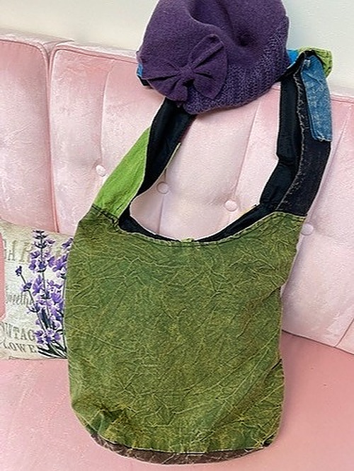 Rising International Handbag